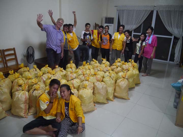 Repacking relief goods with the help of our church members from Barilli.